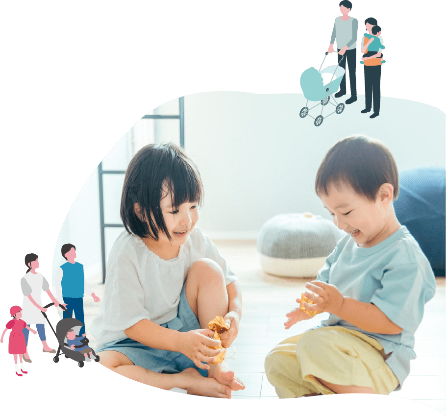 床に座っておもちゃで遊ぶ2人の子ども